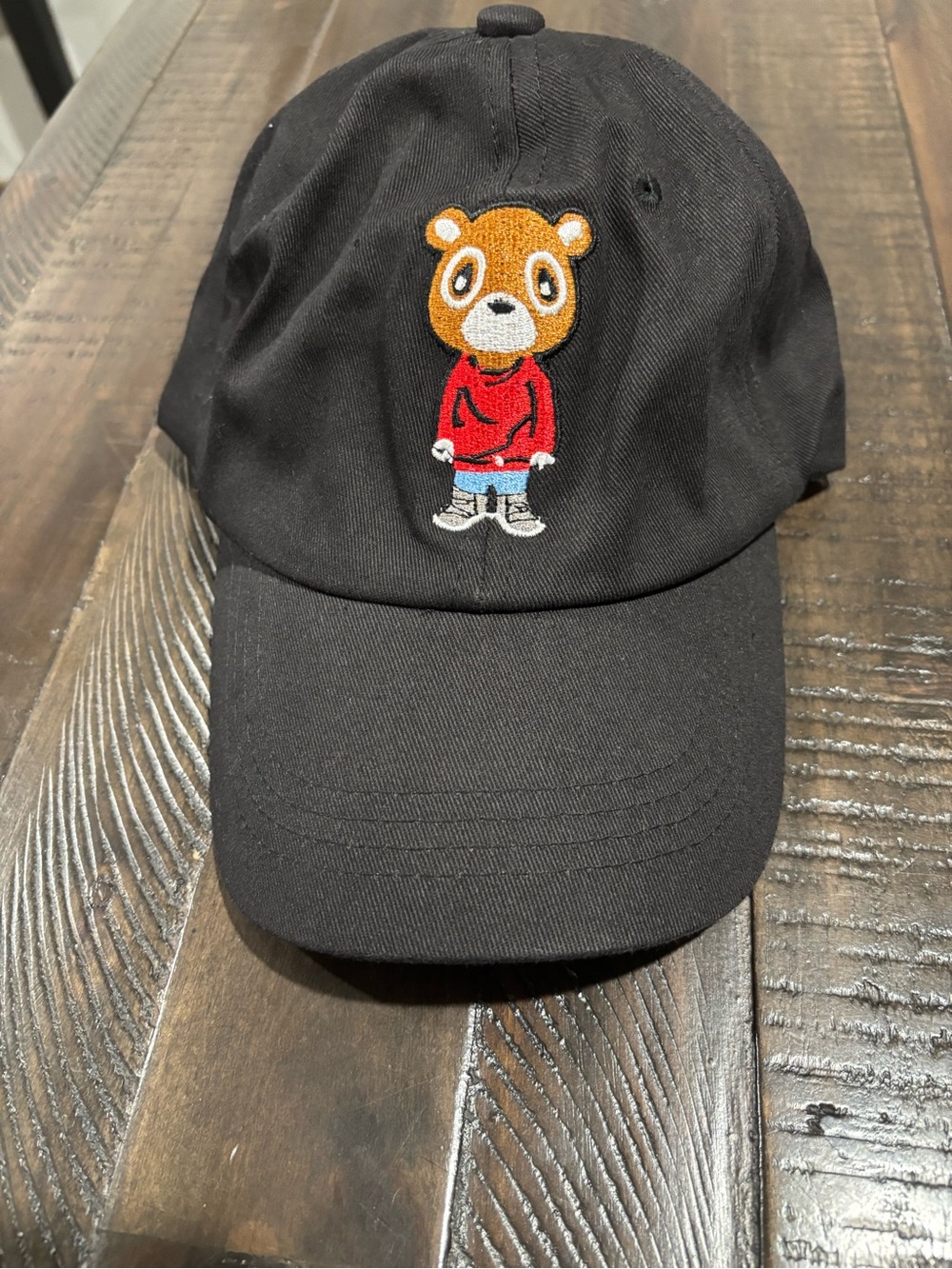 Black Bear Patch Baseball Cap with Red Hoodie Accent